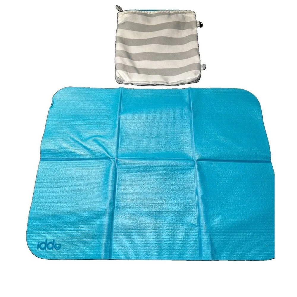 Ubbi On-The-Go Baby Diaper Changing Mat, Portable Foldable Travel Pad